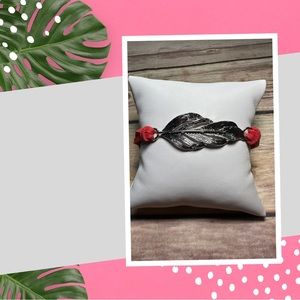 Red Suede with feather detail bracelet
